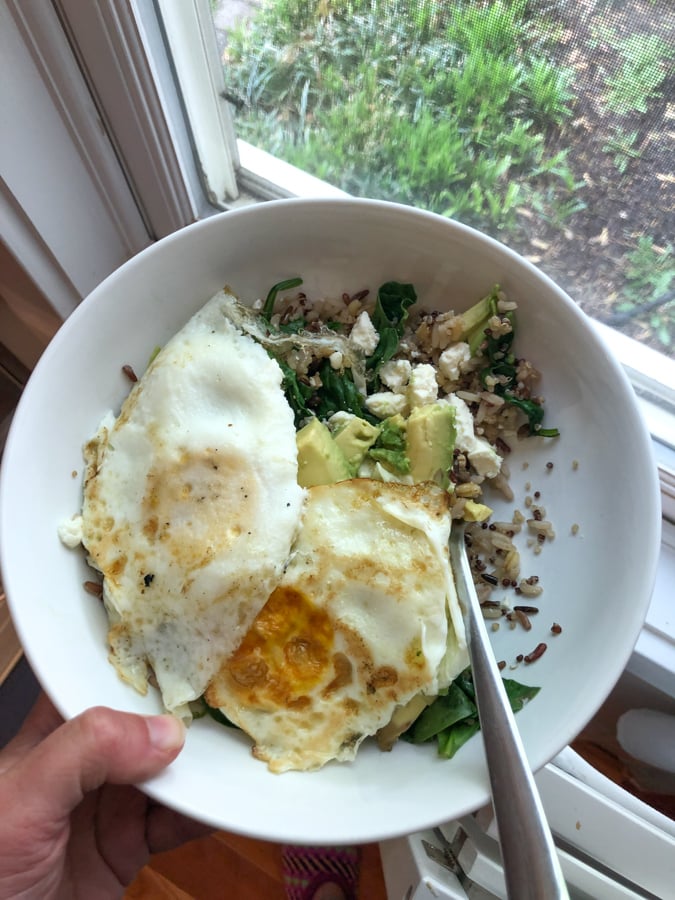 eggs with rice, avocado, wilted spinach