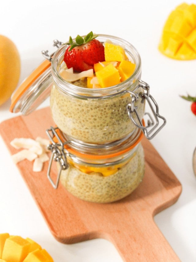 mango chia pudding in jars stacked on top of each other
