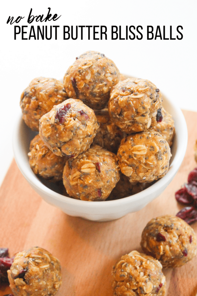 peanut butter bliss balls in a white bowl