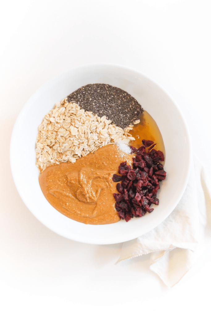 peanut butter balls ingredients in a large mixing bowl