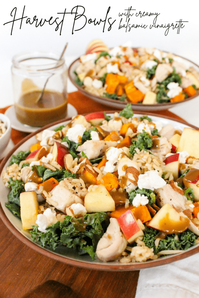 harvest bowls with sweet potato and chicken on a wooden platter