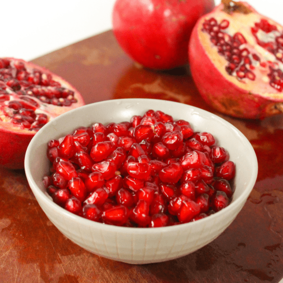 pomegranate seeds in a bowl