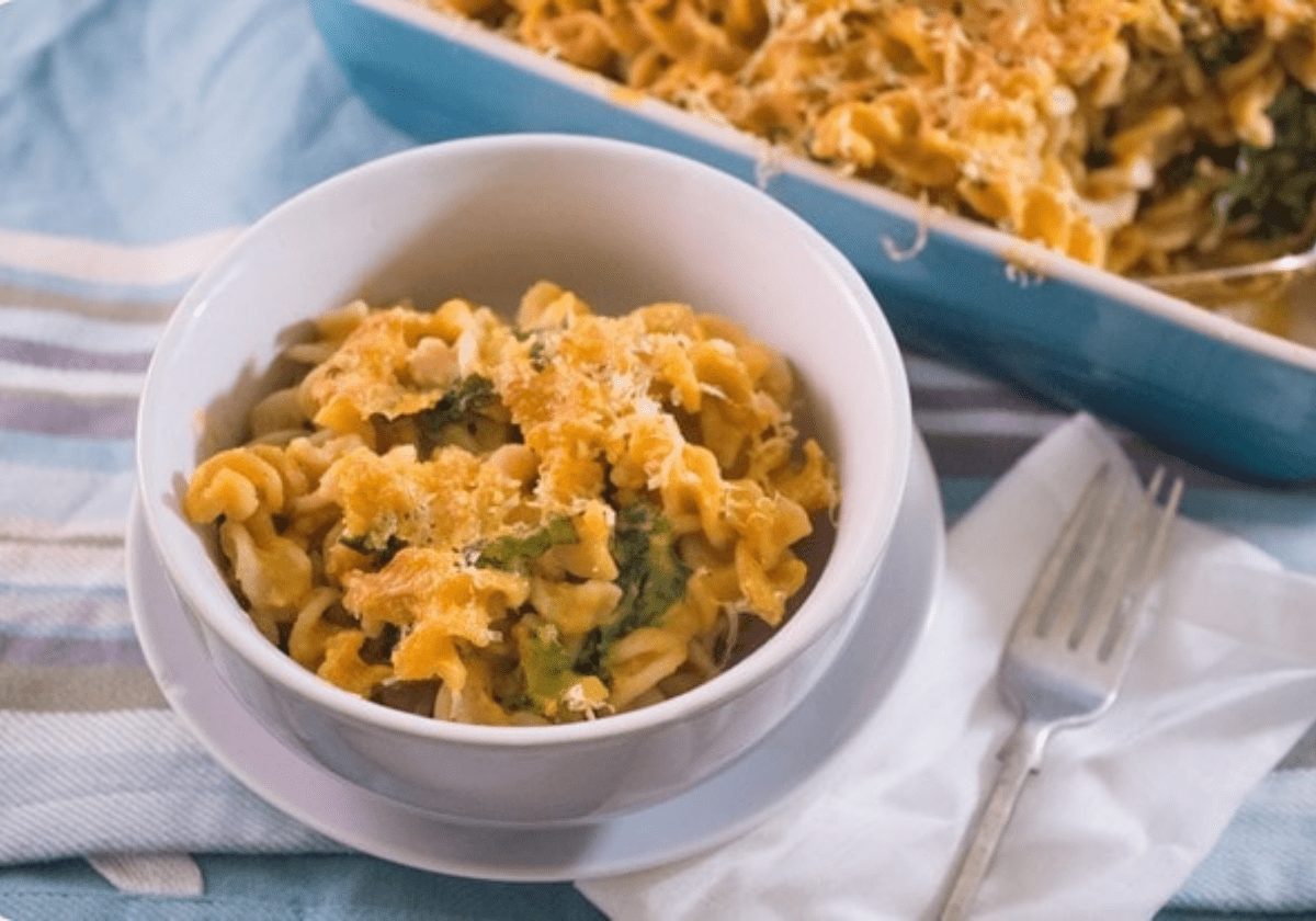 butternut squash mac and cheese in a small white bowl