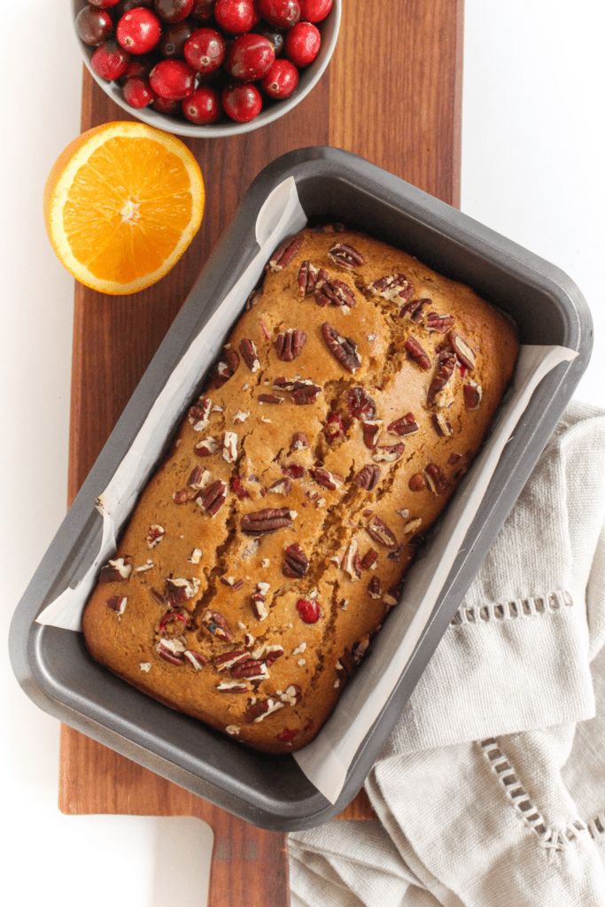 cranberry orange bread in a loaf pan