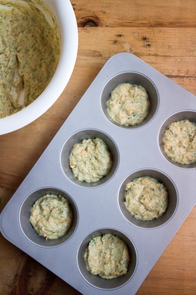 gluten free savory muffin batter in a muffin tin