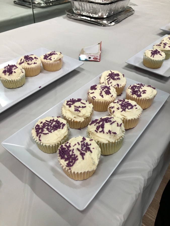 vanilla cupcakes with purple sprinkles