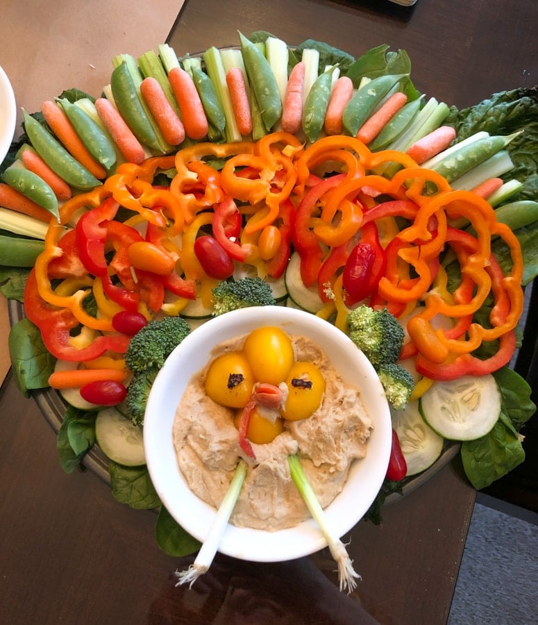 vegetables and hummus in the shape of a turkey