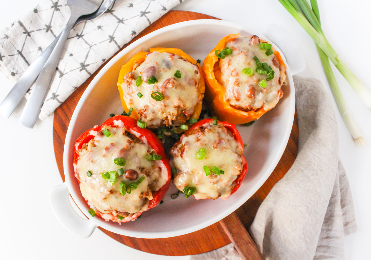 Instant Pot stuffed peppers in a white baking dish