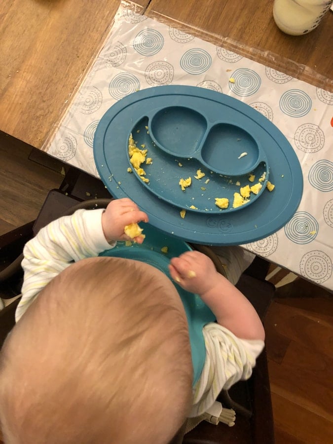baby eating scrambled eggs