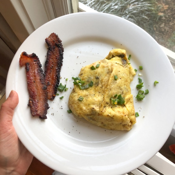 goat cheese and mushroom omelette with bacon