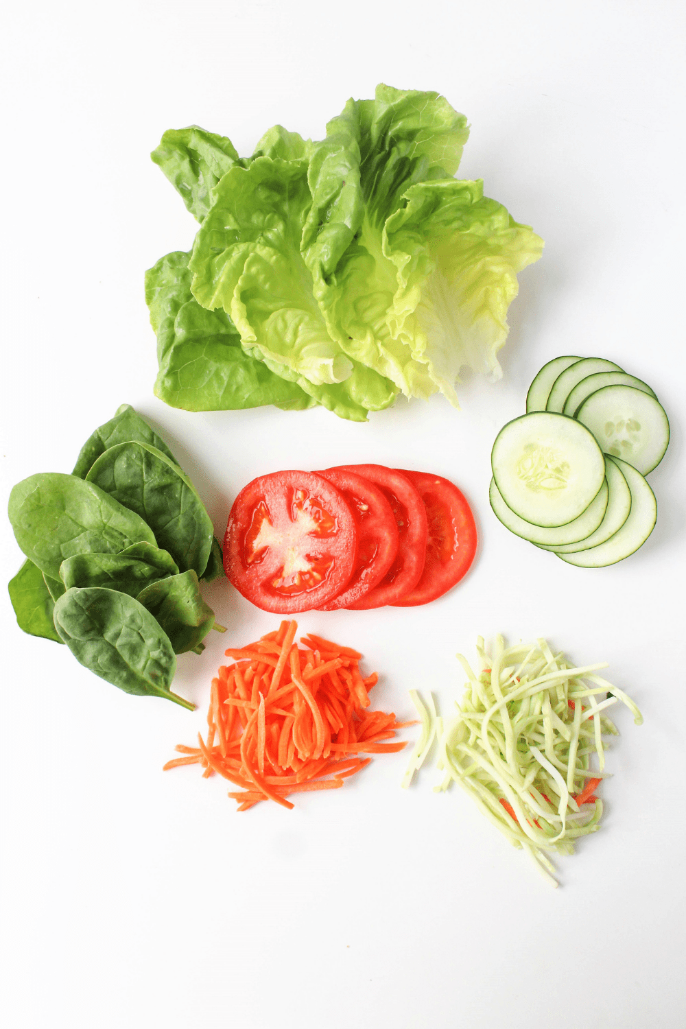lettuce, tomatoes, and cucumbers
