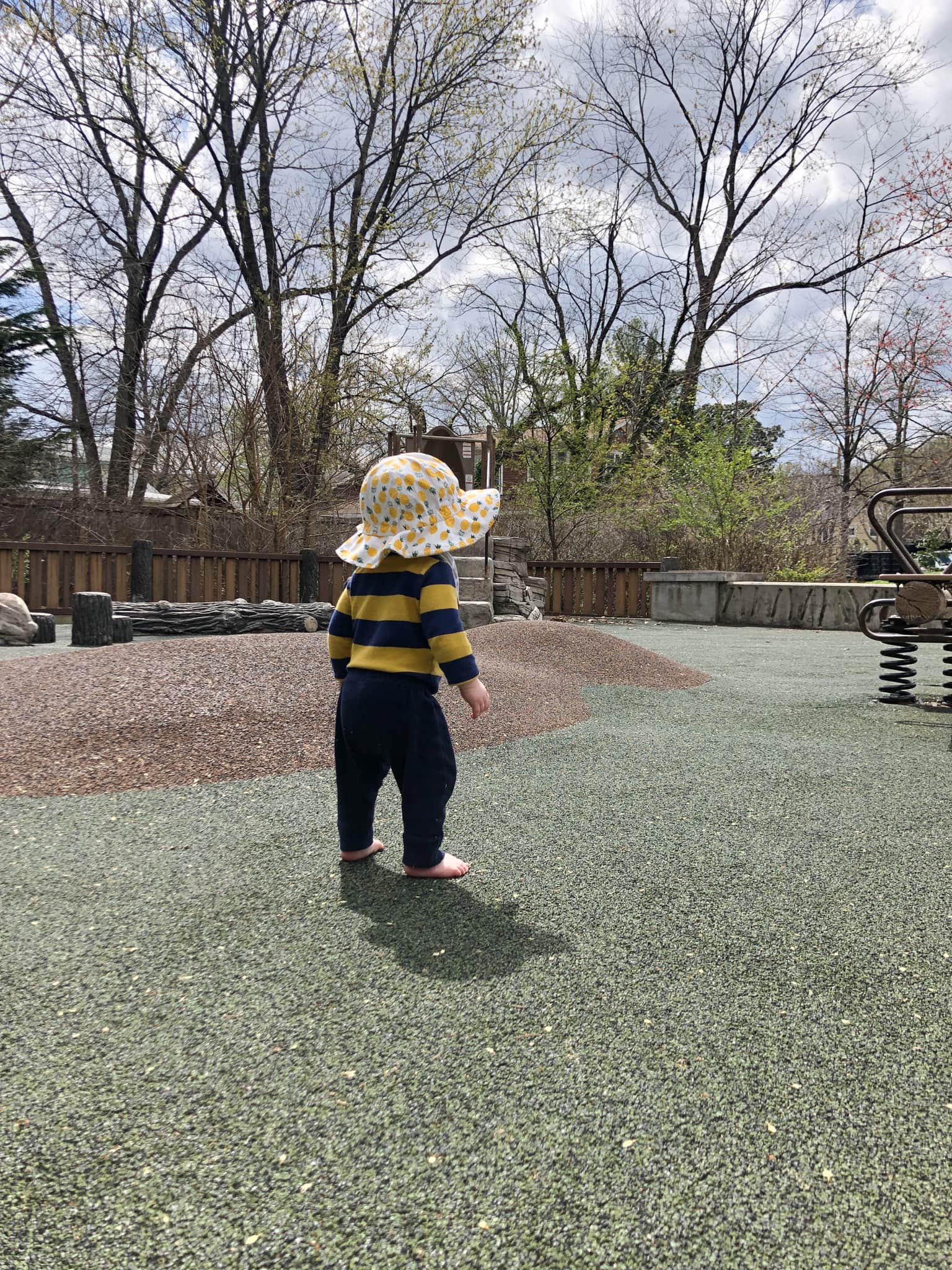 baby standing in playground