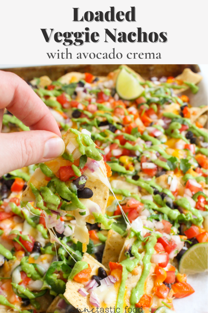 sheet pan loaded vegetarian nachos with avocado crema