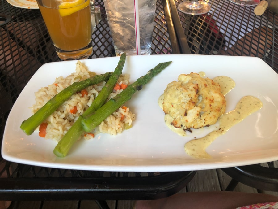 crab cake with rice and veggies from andora restaurant