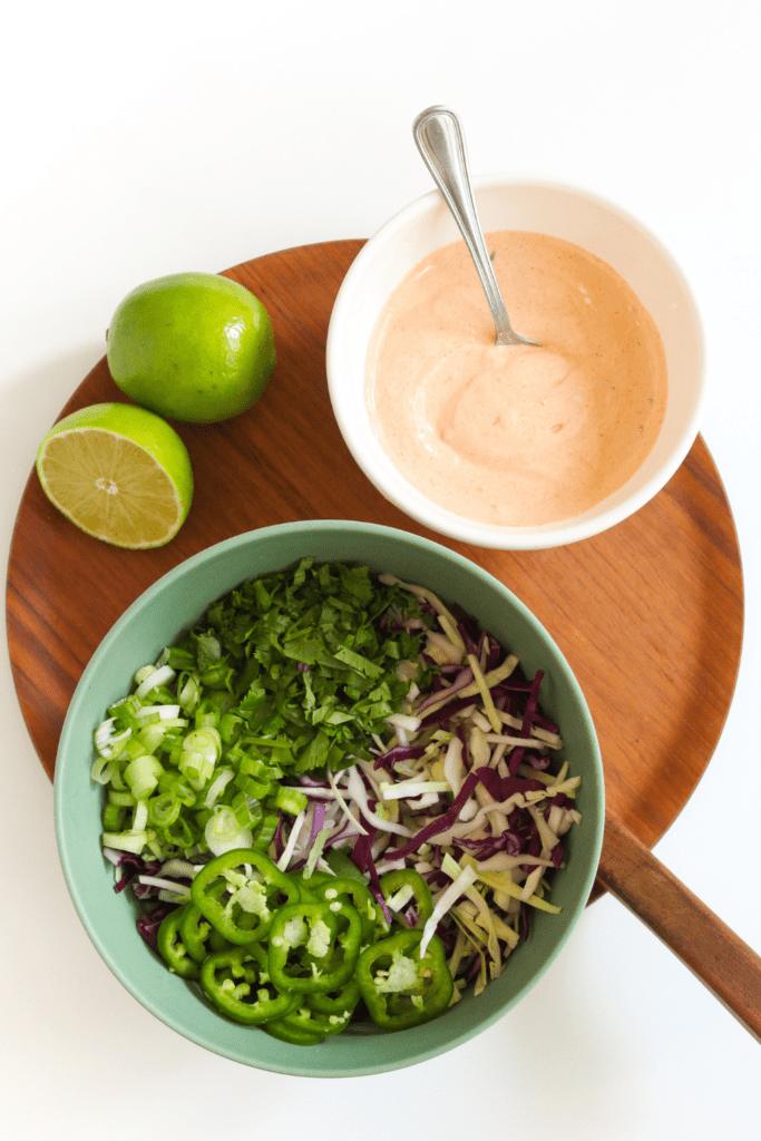 jalapeno coleslaw and chipotle crema with lime