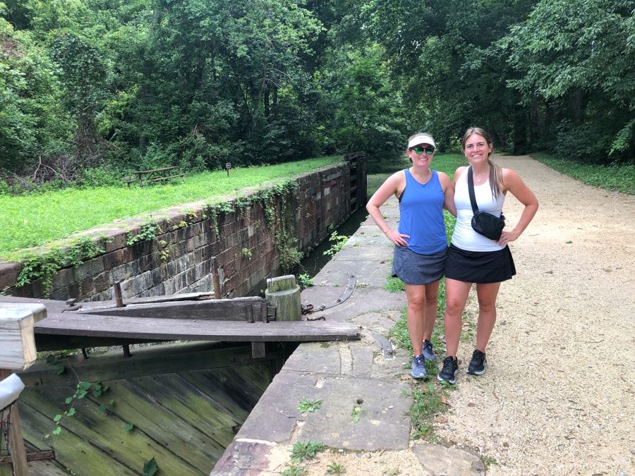 anne mauney and chelsea clark on a trail