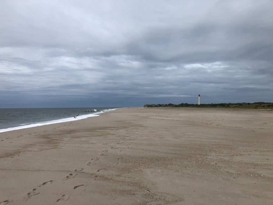 beach with a view of cape may lighthouse