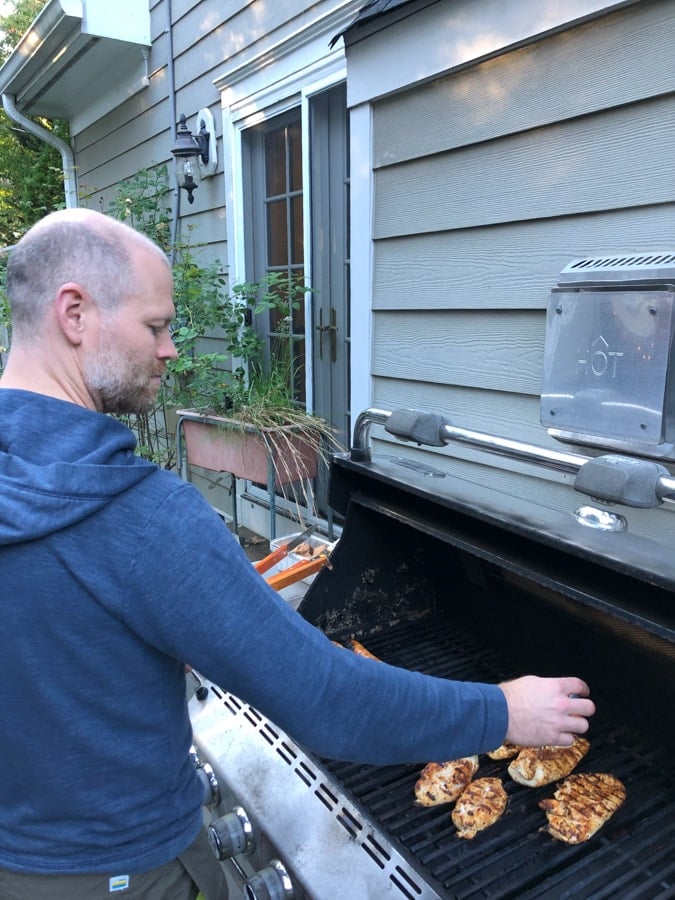 grilling chicken on a grill