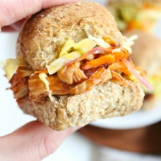 close up of pulled bbq chicken sliders with coleslaw
