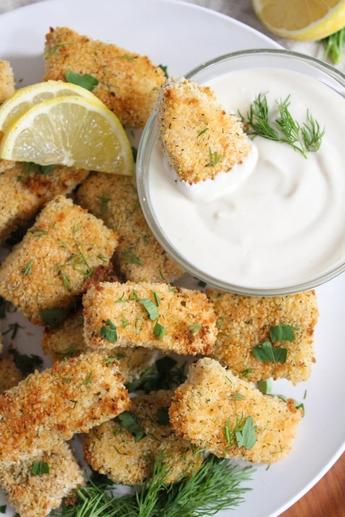 yogurt honey mustard dipping sauce in a bowl with salmon nuggets