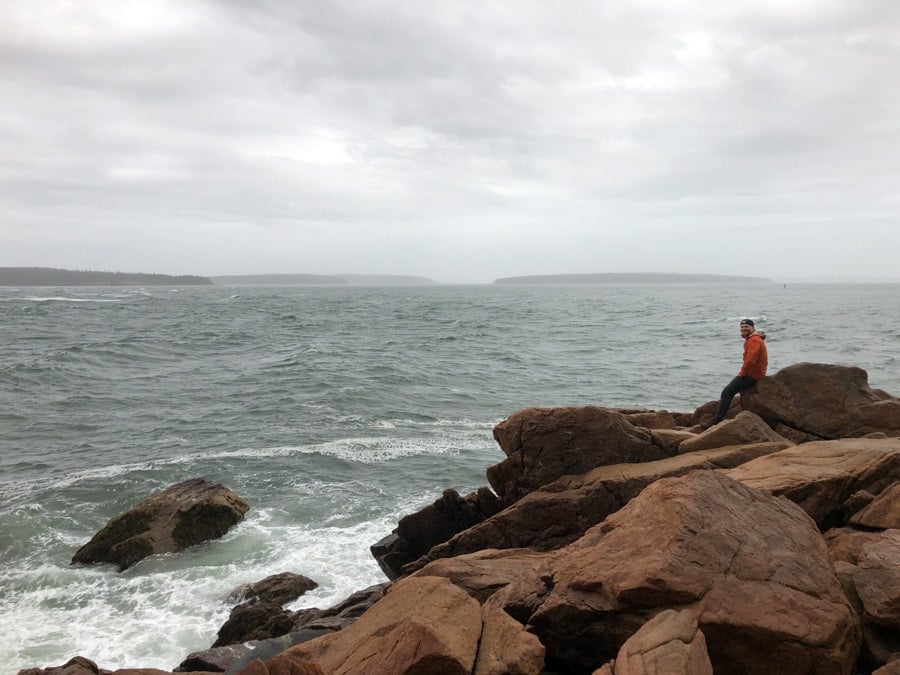 watching waves hit the rocks in maine