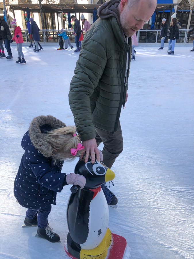 Ice skating with the help of a penguin