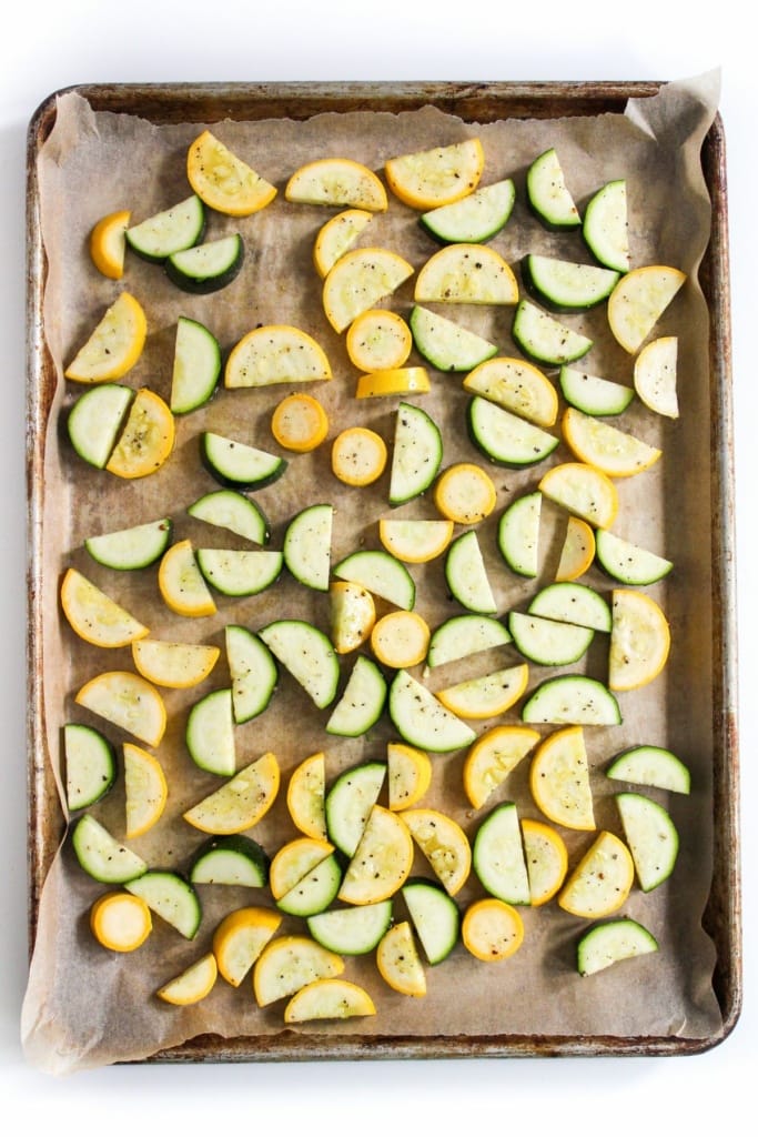 sliced vegetables on a sheet pan