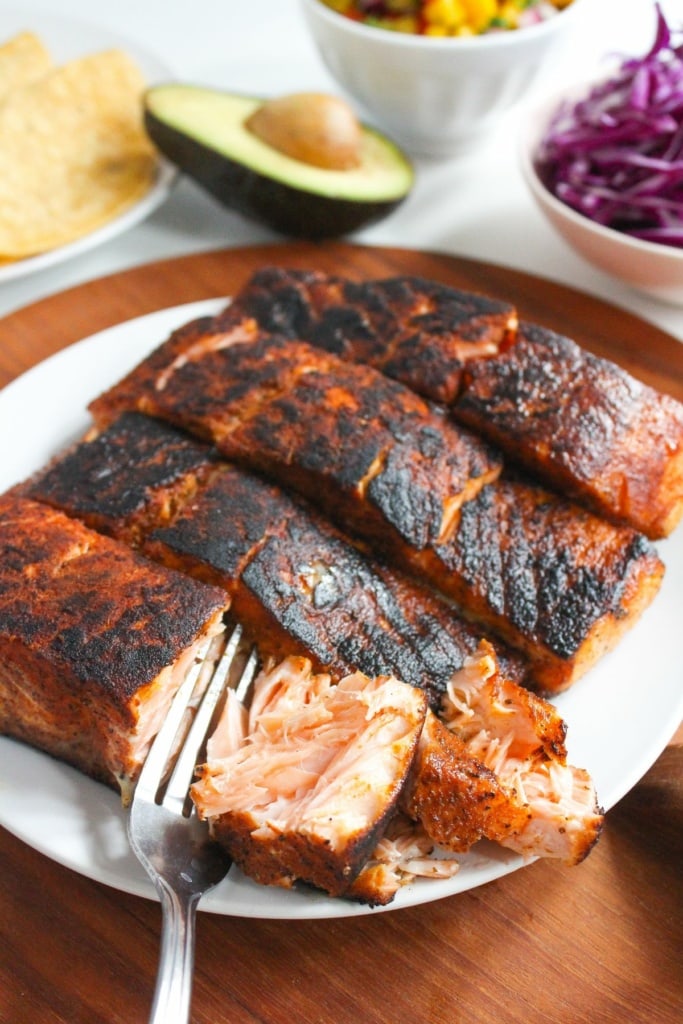 cooked salmon on a white plate