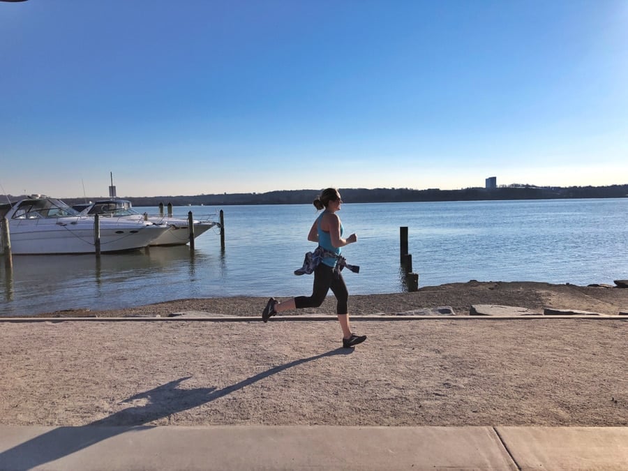 anne mauney running along old town waterfront. 