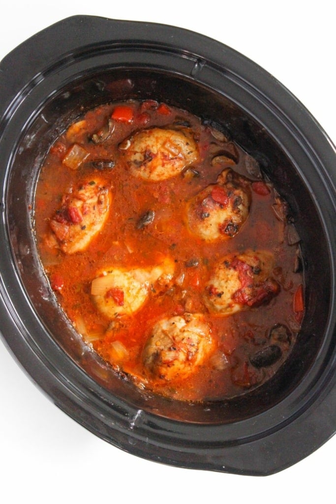 cooked chicken cacciatore in a slow cooker