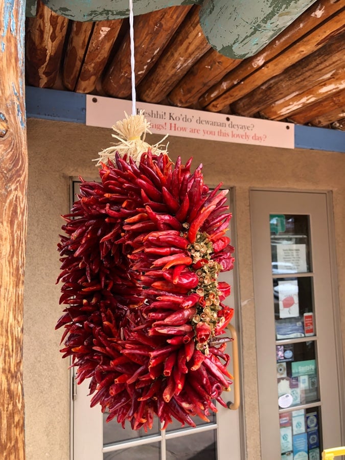 chiles hanging outside a store in new mexico