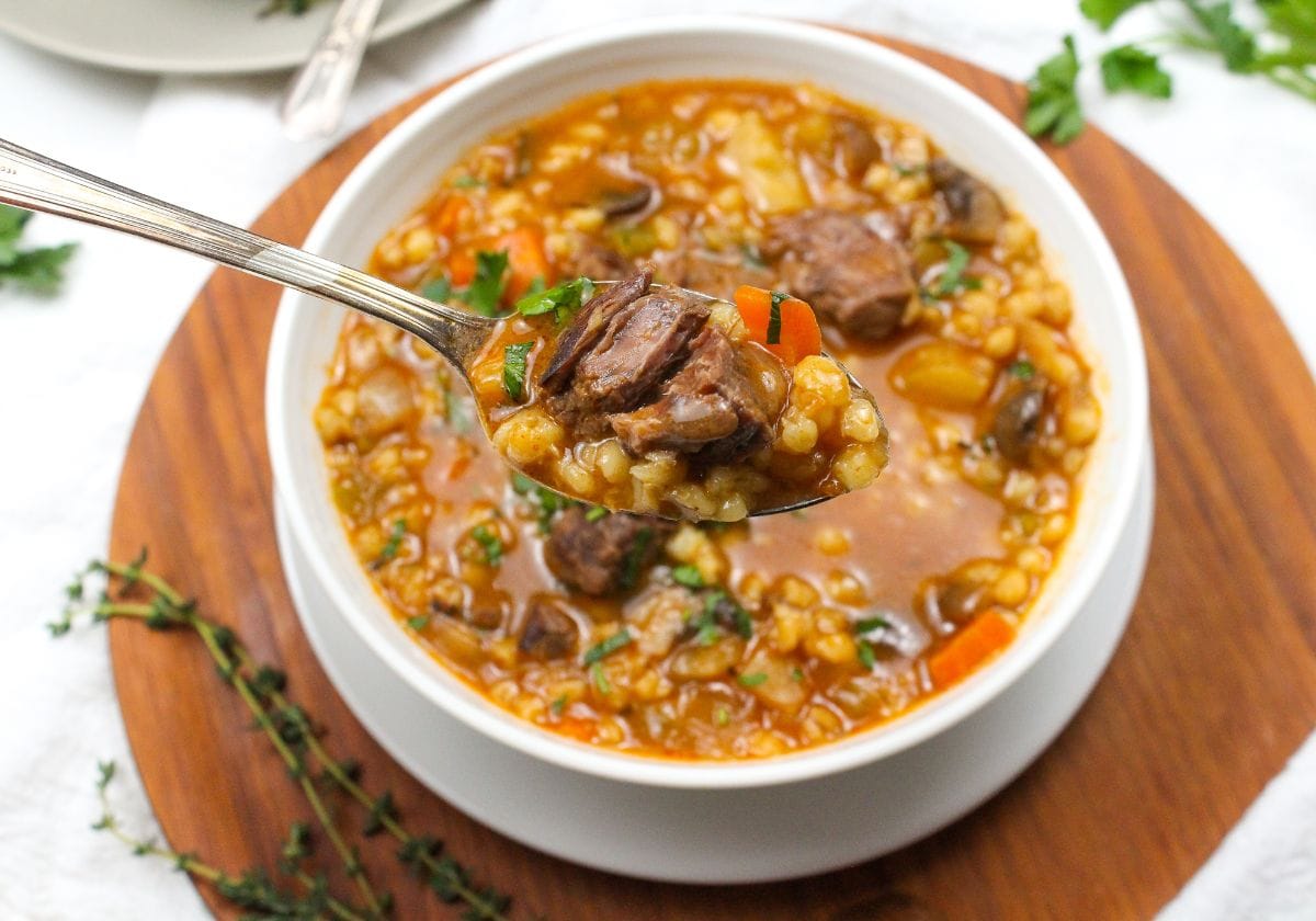 Instant Pot beef and barley soup in a bowl