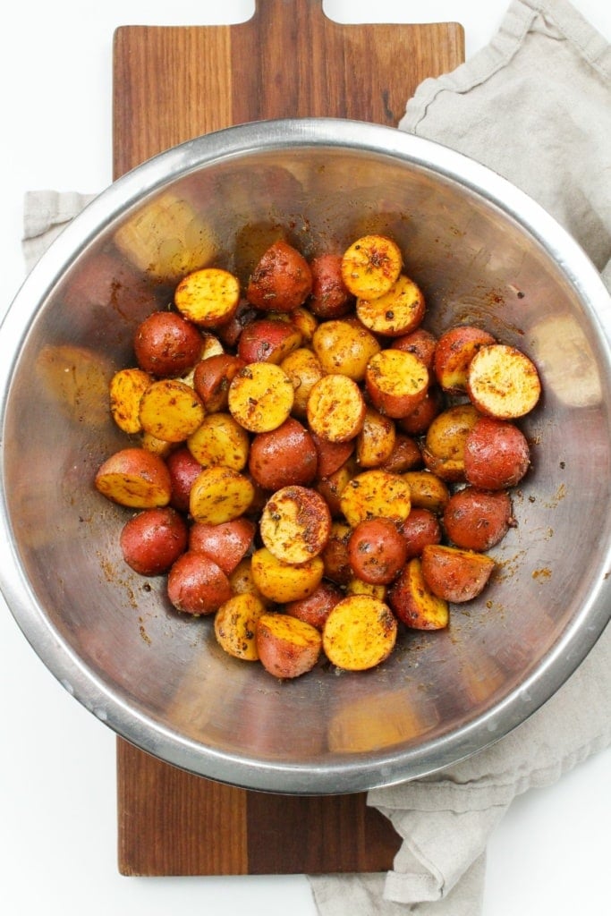 baby potatoes in a bowl with seasonings