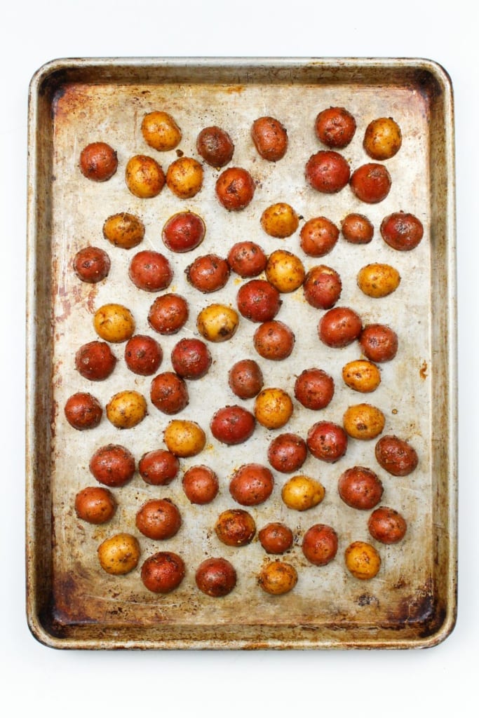 paprika roasted baby potatoes on a sheet pan