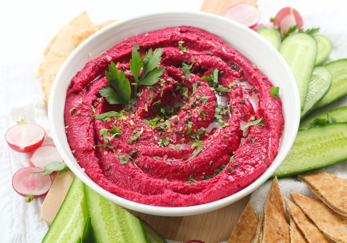 Beetroot hummus with cucumber, radishes and flatbread