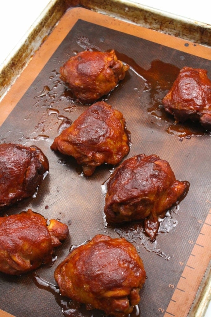 bbq chicken thighs on a sheet pan