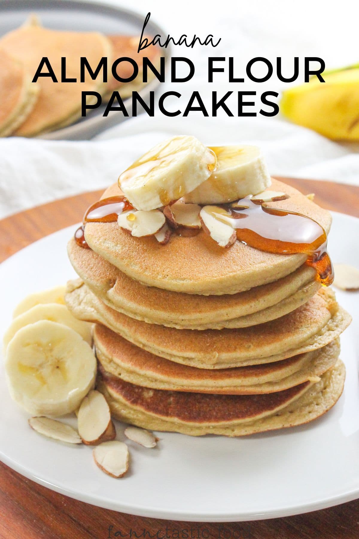 almond flour pancakes with banana and maple syrup