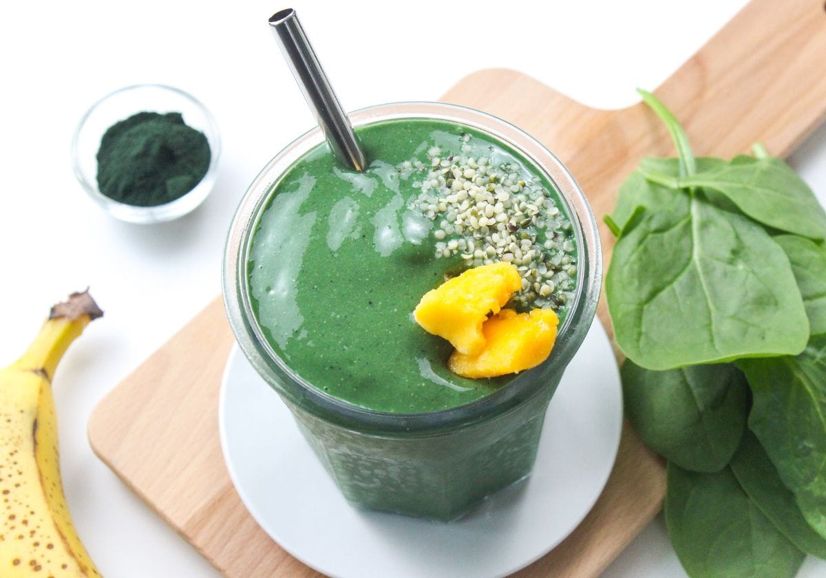 green spirulina smoothie with banana and spinach