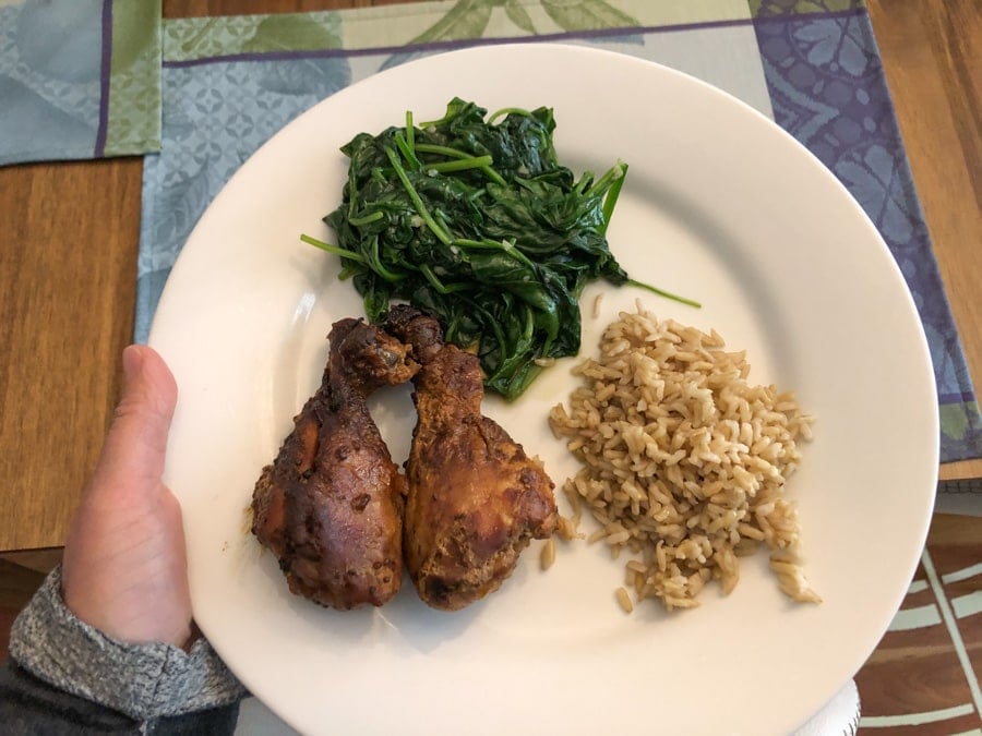 chicken drumsticks, spinach, and rice