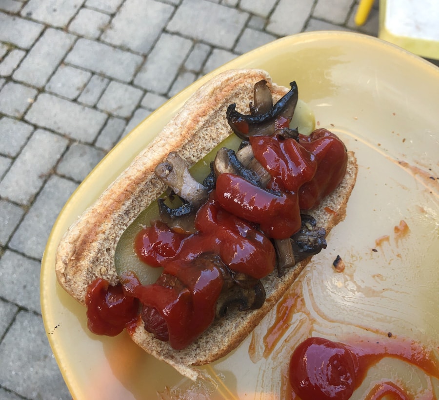 hot dog with mushrooms and ketchup