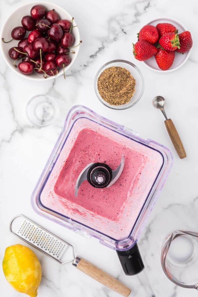 blended frozen fruit and yogurt mixture in a blender