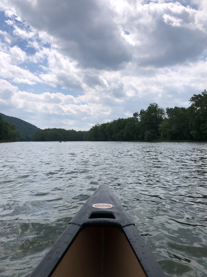 canoe with stormy skies