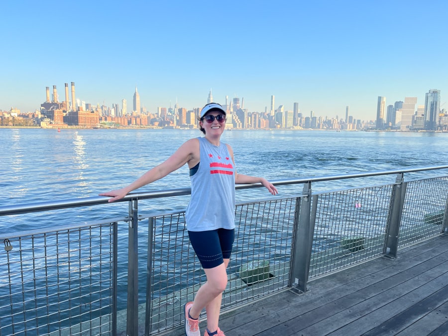 anne mauney standing at the waterfront in brooklyn