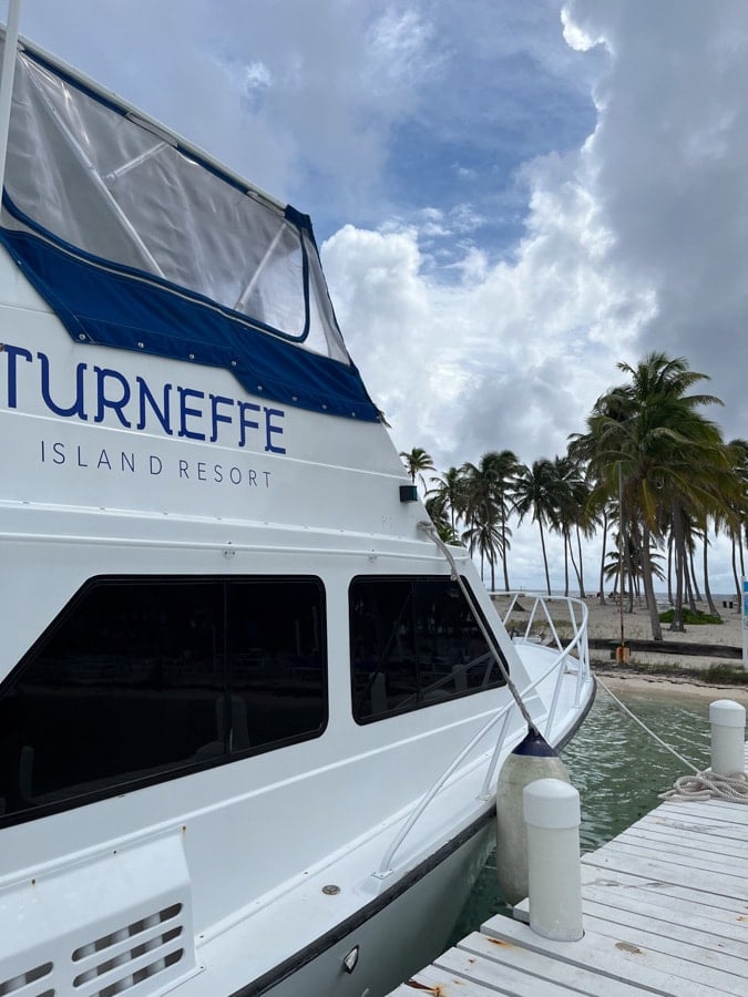 turneffe island resort boat docked at half moon bay