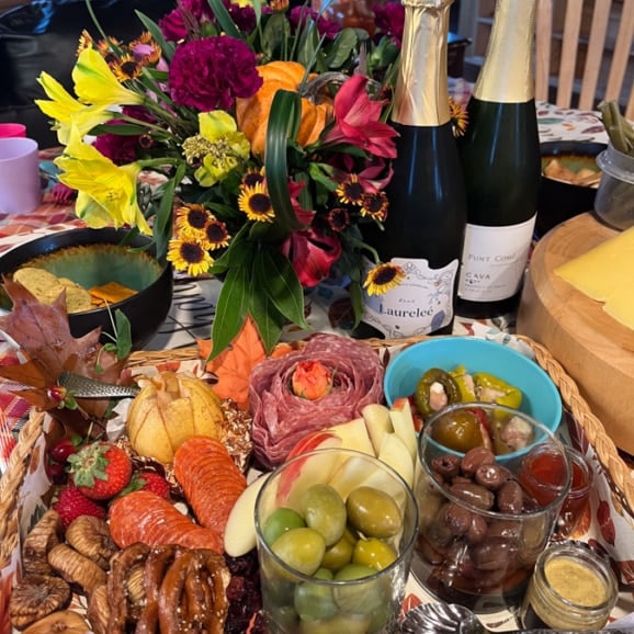 appetizer spread with bubbly wine