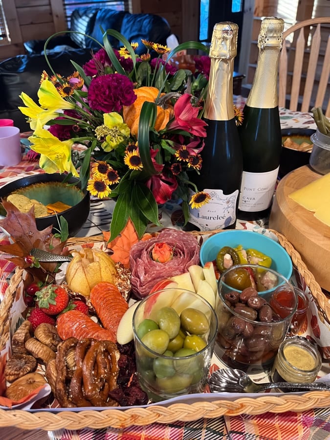 appetizer spread with bubbly wine