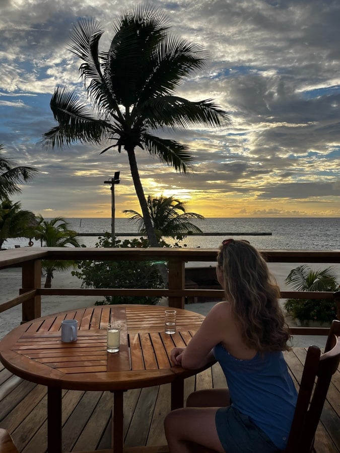 outdoor dining deck on turneffe island resort