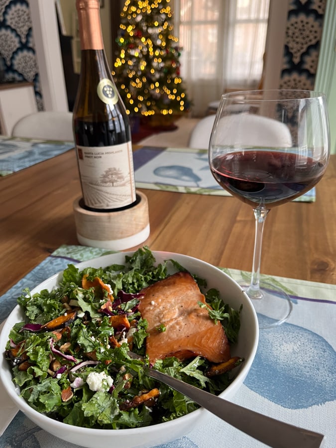 salmon and kale salad with pinot noir.