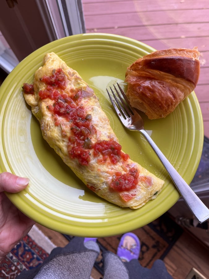 omelette topped with salsa