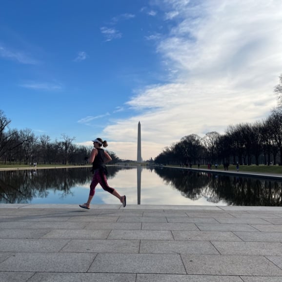 anne mauney running by the reflecting pool in DC